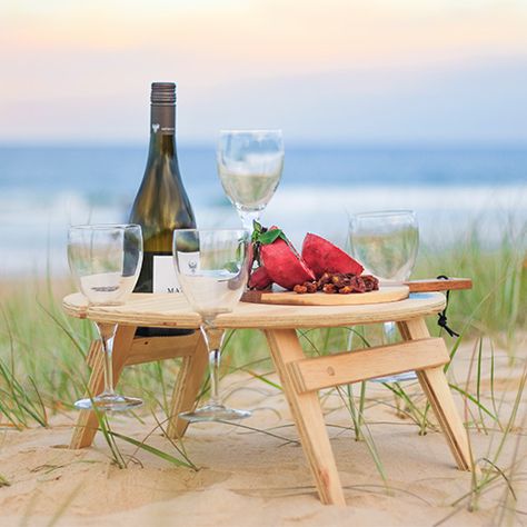 Folding Picnic Table, that will hold 4 wine glasses, a bottle and will keep your food off the ground. Perfect for the beach, camping or a romantic picnic. Only $89. Ship Australia-wide $15. Wine Picnic Table, Outdoor Wine Table, Wine Picnic, Folding Picnic Table, Wine And Cheese, Wine Table, Romantic Picnics, Bed Tray, Wine Glass Holder