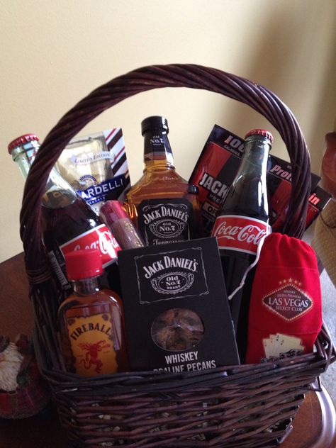 Man Basket for my Brother-in-law  Jack & Coke Whiskey Shots Cigar Beef Jerky Chocolate Nuts Jack And Coke Gift Basket, Whiskey Raffle Basket Ideas, Whiskey Basket Gift For Men, Whiskey Basket Ideas, Donation Baskets, Whiskey Gift Basket, Liquor Baskets, Beef Jerky Gift, Whiskey Gifts Basket