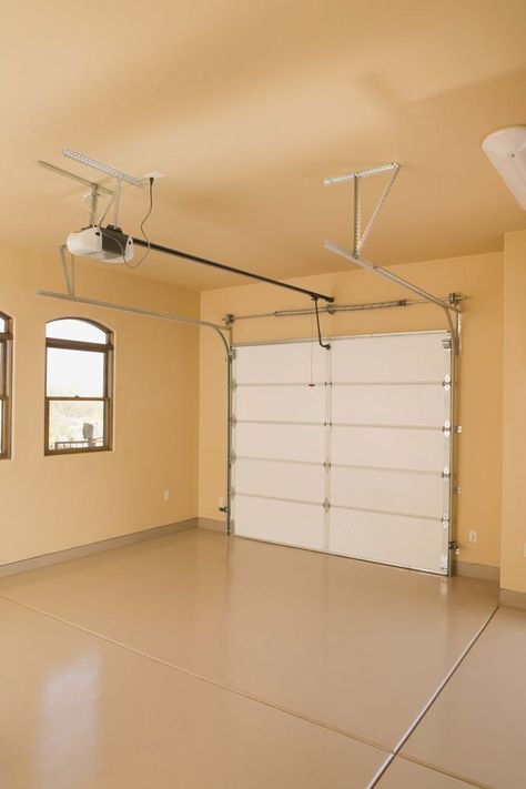 Garage Redo, Garage To Living Space, Overhead Garage Door, Converted Garage, Painted Concrete Floors, Garage Renovation, Garage Room, Garage Bedroom, Overhead Garage