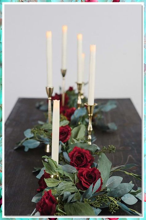 Looking to create a magical ambiance for your winter wedding? Discover 7 stunning winter wedding table decor ideas that will leave your guests in awe. From elegant centerpieces to cozy candle arrangements, these ideas will transform your reception into a winter wonderland. Get inspired and start planning your dream winter wedding today! Red Wine Centerpieces Wedding Ideas, Simple Red Centerpieces, Long Stem Red Rose Wedding Bouquet, Red Black And White Floral Arrangements, Candle And Roses Centerpieces, Black And White Wedding With Red Roses, Christmas Wedding Flowers Centerpieces, Romantic Party Ideas, Red And White Roses Centerpieces