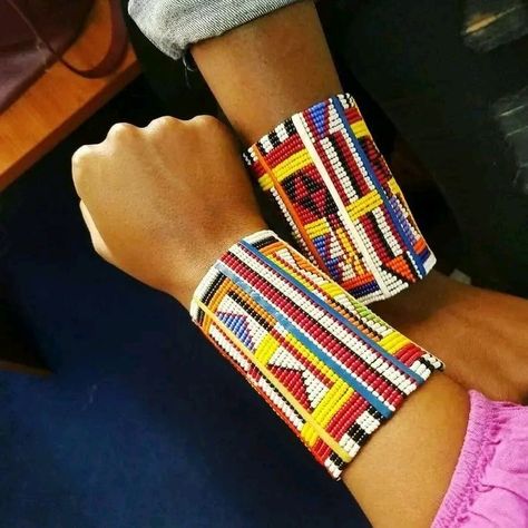 A pair of African Beaded bracelets Comes in pairs Made of beads Available for wholesale Ships from Nairobi Kenya to the rest of the world. Buy with other items and get free delivery for the other as they come together as one package. Delivery is done via DHL EXPRESS and tracking number provided. Shop link https://african1stores.etsy.com Masaai Attire, Maasai Dress, Maasai Jewelry, African Beaded Bracelets, Hand Bracelets, Zulu Women, Pokemon Jewelry, Bracelets Christmas, African Pattern Design