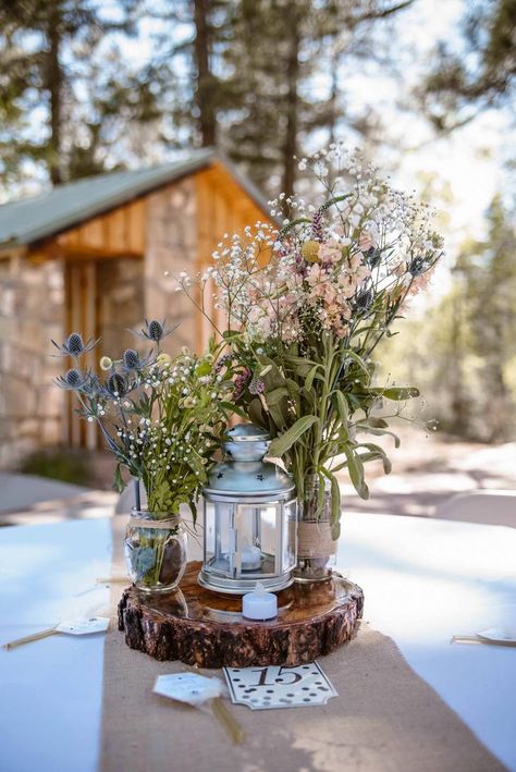 Camping Themed Wedding Centerpieces, Camping Lantern Centerpieces, Outdoorsy Wedding Centerpieces, Outdoorsy Centerpieces, Hiking Theme Baby Shower Ideas, Camp Centerpieces, Camping Centerpiece, Wild Centerpieces, Fredericksburg Wedding