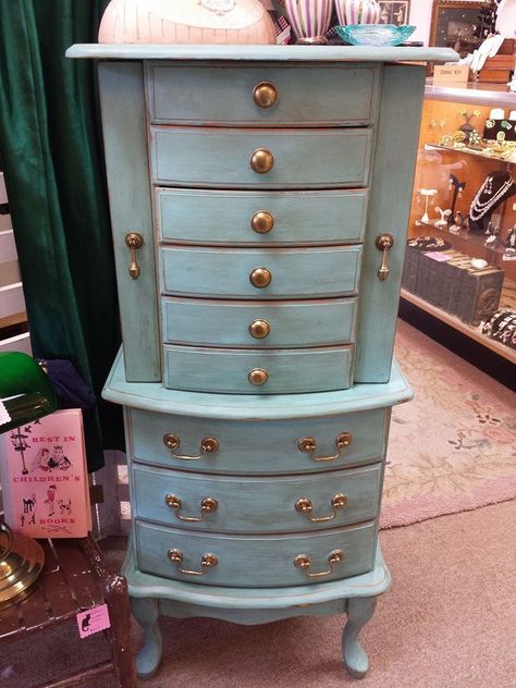 Very lovely, very large free standing jewelry armoire done in our signature turquoise color with the dark Annie Sloan wax. She has her all original brass hardware and rose pink felt inside. The side doors open to hold necklaces and all drawers hold rings, earrings, bracelets, etc. Very chic! Armoire Redo, Jewelry Armoire Diy, Jewelry Armoire Makeover, Clock Makeover, Standing Jewelry Box, Armoire Ideas, Craft Armoire, Paint Workshop, Painted Jewelry Armoire