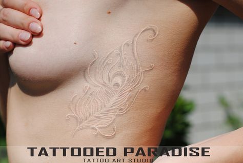 White Feather Tattoos, Mastectomy Tattoo, Tattoo Finger, Tattoo Beautiful, White Tattoos, Paradise Tattoo, Peacock Feather Tattoo, Peacock Tattoo, White Ink Tattoo