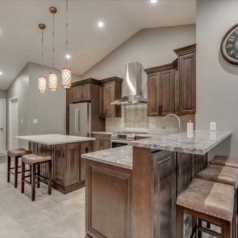 With dated linoleum floors and a layout that wasn’t quite perfect for cooking elegant meals, this kitchen’s homeowners called Aleto looking for an updated kitchen in both appearance and functionality. We removed a wall between the kitchen and living room to create an open floor plan that connected the spaces. This allowed for a large island with seating, and a great space for entertaining. The modern finishes took this kitchen from the 1980s to the 21st century in style. Elegant Meals, Linoleum Floors, Removing A Wall, Kitchen S, Linoleum Flooring, Island With Seating, Home Renovations, Furniture Catalog, St Louis Mo