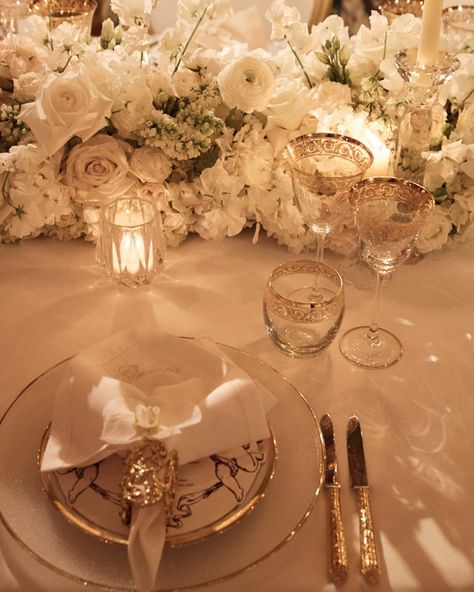 ✨ A wedding dinner fit for the gods, held in the truly opulent Apollo’s Muse ✨ Inspired by the elegance of Ancient Greece and Bacchus himself, indulgence flowed with prestige champagne at the wedding dinner of K + S. Bespoke cherub-themed menus echoed the venue’s classical grandeur, while the gold-gilded crockery elevated each toast and emulated the extravagance of the room. The high candles added to the atmosphere as flickering candlelight danced across white hues and marble details, crea... Gold And White Wedding Decorations, White And Gold, Gold And Cream Wedding, White And Gold Wedding Themes, Gold Place Setting, White Linen Tablecloth, 20th Bday, White And Gold Wedding, White Wedding Decorations