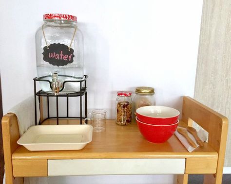 Three Minute Montessori - Drink Station at How we Montessori Montessori Self Serve Station, Montessori Kitchen Station With Mini Fridge, Montessori Mini Fridge, Montessori Bathroom Station, Montessori Washing Station, Montessori Trays, Snack Station, Montessori Color, Toddler Kitchen