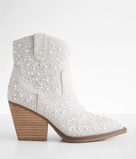 Very G Kady Glitz Western Ankle Boot - White US 7-1/2, Women's Silver Faux pearl and rhinestone faux suede bootie Side zip detail Cushioned footbed 7 1/2 shaft 3 1/4 heel. Upper: Fabric. Outsole: TPR.. WOMEN'S SHOE SIZE CONVERSION CHART US 5 5.5 6 6.5 7 7.5 8 8.5 9 9.5 10 11 12 EU 35-36 36 36-37 37 37-38 38 38-39 39 39-40 40 40-41 41-42 42-43 UK 3 3.5 4 4.5 5 5.5 6 6.5 7 7.5 8 9 10 *Conversion sizes may vary. Available in whole and half sizes. Apparel & Accessories > Shoes Pearl Cowboy Boots, Bridal Cowgirl Boots, Wedding Booties For Bride, Wedding Cowgirl Boots For Bride, Wedding Cowboy Boots For Bride, Sparkly Cowgirl Boots, Boots For Wedding, Bridal Cowboy Boots, Western Wedding Boots