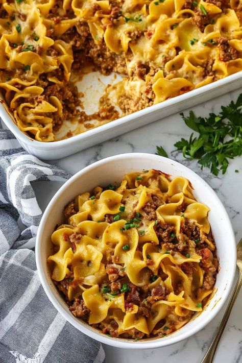 This sour cream noodle bake is full of so much goodness! With tender noodles, ground beef, and plenty of cheese, it's so creamy and satisfying. Sour Cream Noodle Bake Pioneer Woman, Noodles Ground Beef, Sour Cream Noodle Bake, Noodle Bake, Baked Cream Cheese Spaghetti, Cheese Spaghetti, Cooking Basics, Sharp Cheddar, Sharp Cheddar Cheese