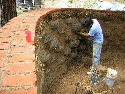 Tire Wall Fence, Tire Retaining Wall Ideas, Tire Fence, Tire Retaining Wall, Tire House, Tire Wall, Repurposed Tire, Reuse Old Tires, A Frame Cabin Plans