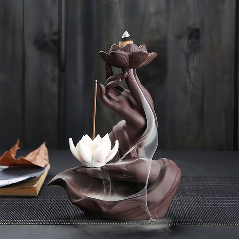 PRICES MAY VARY. Create a calming and serene atmosphere with the RE RELIURE Lotus in Hand back flowing Incense Burner, designed to mimic a soothing incense burner waterfall as the incense cones burner. Crafted with high-quality materials, this insent. burner waterfall is durable and built to last. RE RELIURE ceramic incense burner or insence burner is beautifully crafted with a lotus in hand design, adding a touch of elegance to any space. Backflow incense holder waterfall can give people a wond Lotus Incense Holder, Insent Burner, Incense Fountain, Homey Touches, Zen Room Decor, Incense Waterfall, Backflow Incense Holder, Fountain Waterfall, Ceramica Ideas