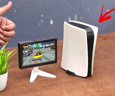 Pi Station Gaming Console With 3D Printed Tiny Play Station 5 Case: Hey everyone, I've put together a small retro gaming setup! I set up RetroPie on a Raspberry Pi 4 and crafted a custom 3D-printed case inspired by the design of the PlayStation 5. It's like a mini version of the PlayStation 5, though it can't handle… Retro Gaming Setup, Retro Pi, Play Station, Modern Games, Gaming Station, Playstation 5, Gaming Gear, Gaming Console, Gaming Setup