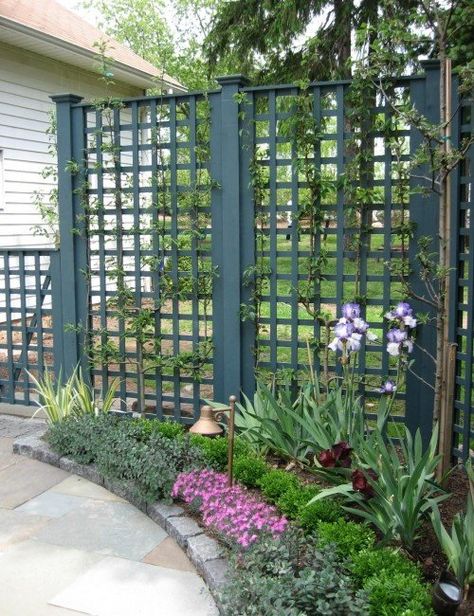 Set your garden apart from the rest of your yard by setting it up with a trellis.  Styles and inspirations for these outdoor structures are endless. Here are some ideas for using wood, traditional designs, and coloring far outside the lines with completely unconventional ideas. Use Wood As Inspiration For Your Trellis Wood is a... Read More Lattice Fence, Garden Vines, Garden Screening, Side Yard, Garden Trellis, Garden Fencing, Gorgeous Gardens, Fence Design, Garden Structures