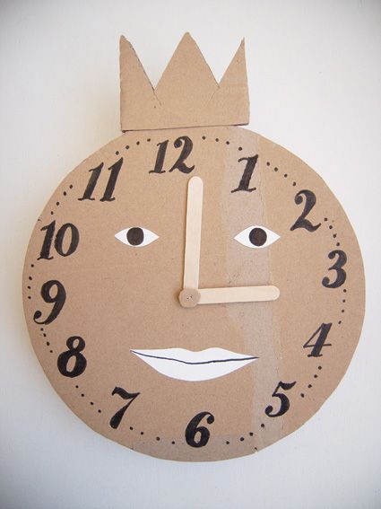 9 CREATIVE DIY CLOCKS TO HELP KIDS TELL TIME Time Travel Crafts, Cardboard Clock, Learning Clock, Clock Diy, Crown Decor, Cardboard Toys, Handmade Charlotte, Wonderland Theme, Clock For Kids