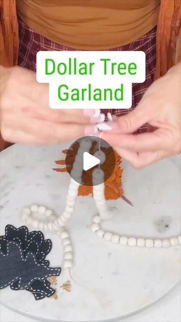 Olivia Parazine on Instagram: "DIY Dollar Tree garland! Happy crafting! 🍁🧡#dollartree #dollartreefall #dollartreediy" Bead Garland Decor Ideas Mantle, Dollar Tree Fall Garland Diy, Fall Diy Garland, Thanksgiving Garland Diy, Dollar Tree Christmas Garland, Dollar Tree Thanksgiving Decor Diy, Diy Bead Garland, Dollar Tree Garland, Dollar Tree Thanksgiving Decor