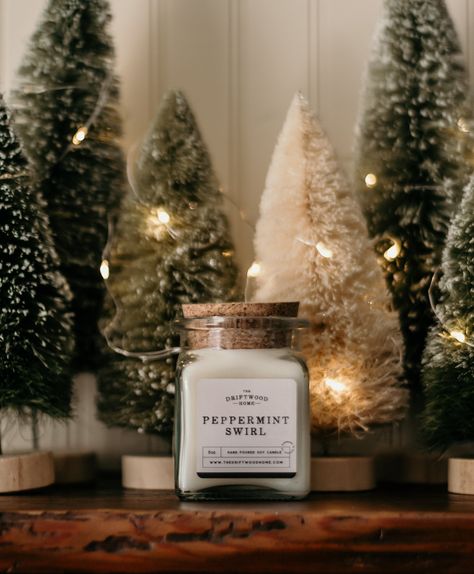 The Driftwood Home Holiday Candle Collection features our soy blend wax with fragrance loads of 8-10% depending on scent. It does not include any color or stabilizer additives and burns with a cotton wick. Candles are poured into apothecary style jars with a cork lid or straight style jars with a metal lid.  Our Peppermint Swirl is a cool icy treat featuring notes of sweet peppermint in a creamy vanilla candy.  Note Profile: Top - Peppermint Middle - Sweet Cream Bottom - Corn Mint 8 oz : 45+ hou Apothecary Style, Cinnamon Honey, Suffolk Va, Gingerbread Latte, Butter Honey, Holiday Candle, Candles Photography, Coffee Candle, Sweet Cream