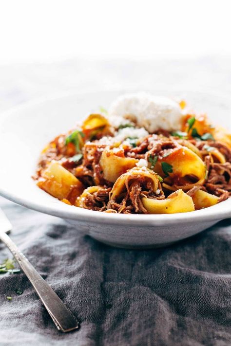 Slow Cooker Beef Ragu with Pappardelle! We're making this cozy, comforting Beef Ragu with Pappardelle! Steak is braised in the crockpot for hours with garlic, tomatoes, veggies, and herbs, then shredded and piled high on pappardelle with Parm cheese. #ragu #beef #pasta Beef Ragu Slow Cooker, Slow Cooker Beef Ragu, Ragu With Pappardelle, Beef Ragu, Pappardelle Pasta, Beef Pasta, Flank Steak, Slow Cooker Beef, Beef Broth