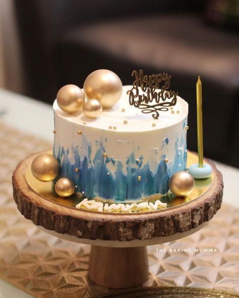 Bringing a touch of gold and elegance to birthday celebrations with this hand-painted blue and white abstract cake, adorned with golden spheres ✨🎂. Every detail, from the textured frosting to the personalized name, is made with love and care. 💙 #homebaker #cakeart #birthdaycakes #customcakes #goldcake #blueandgold #handpaintedcake #bakersofinstagram #cakesofinstagram #thebakingmumma Blue Gold Birthday Cake, Abstract Cake, Hand Painted Cakes, Wedding Cakes Blue, Blue Cakes, Gold Cake, Touch Of Gold, Birthday Celebrations, Cake Art