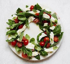 CAPRESE SALAD - Christmas wreaths that you can eat by Suzannah Butcher | Daily Mail Online Food Wreath, Christmas Salad Recipes, Christmas Buffet, Christmas Salads, Party Platter, Christmas Lunch, Cold Appetizers, Deli Food, Christmas Brunch