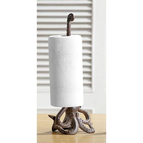 Finally: the combination of form and function that your kitchen has been waiting for. A single, curvy tentacle holds your paper towels over a secure, heavy octo base, adding personality and a clever touch to the countertop. Wipeclean metal. 15"H.