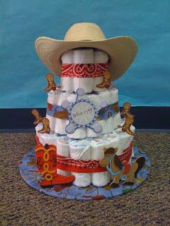 Journey: Cowboy Diaper Cake Cowboy Diaper Cake, Cowboy Baby Shower Theme, Country Baby Shower, Cowboy Baby Shower, Baby Shower Diaper Cake, Baby Diaper Cake, Shower Bebe, Baby Shower Diapers, Baby Cowboy