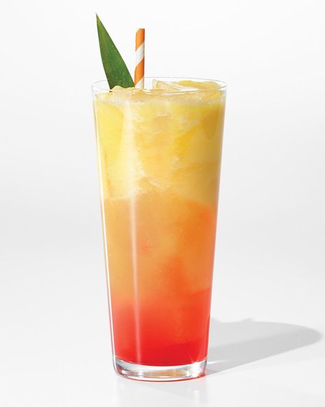 A basic brunch turns into a tropical party when you serve this mouthwatering ombre mocktail. Guava Mocktail, Luau Party Desserts, Aloha Party Punch, Tiki Cake, Grenadine Syrup, Palm Tree Fruit, Hawaiian Cake, Caribbean Party, Pineapple Guava