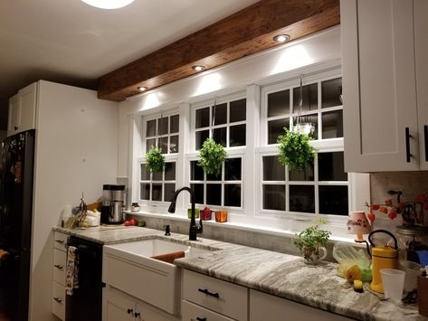 Wood Beam Over Kitchen Sink, Beam Over Stove, Fake Beams On Ceiling Kitchens, Wood Beam Above Kitchen Sink, Faux Beam Kitchen, Faux Beam In Kitchen, Faux Beams With Lights, Kitchen Beam Ideas, Faux Kitchen Beams