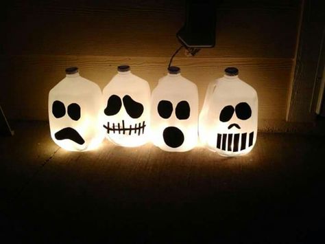 Milk jug ghost faces... Black sticker foam  White gallon milk jugs Stringed lights for glow effect. Halloween Gallon Jugs, Milk Gallon Ghost, Halloween Milk Jugs Diy, Halloween Milk Bottle Lanterns, Halloween Party Hacks, Milk Jug Ghosts, Halloween Milk Jugs, Milk Jug Jack-o'-lanterns, Milk Jug Crafts