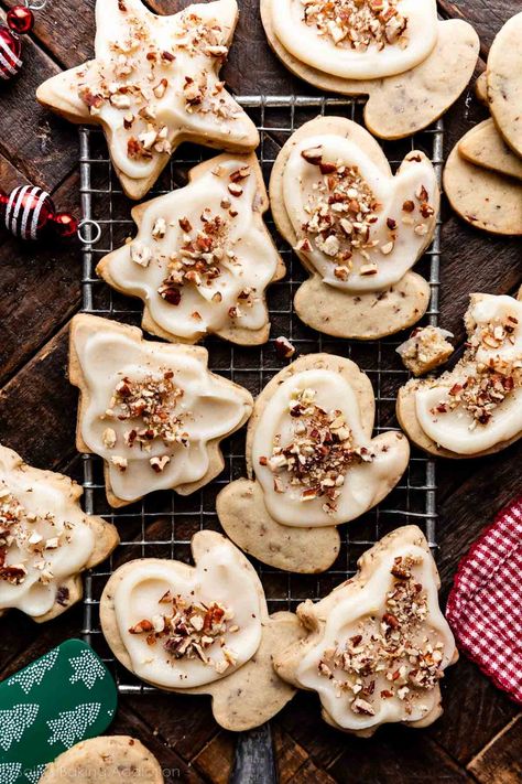 These pecan sugar cookies combine brown sugar, toasted pecans, a hint of cinnamon, and brown butter icing to create a flavorful upgrade to the traditional cut-out sugar cookie. No decorating skills required! Recipe on sallysbakingaddiction.com Butter Pecan Cutout Cookies, Sugar Cookie Aesthetic Christmas, Pecan Cutout Cookies, Pecan Sugar Cookies With Brown Butter Icing, Pecan Sugar Cookies, Cookies With Brown Butter, Brown Butter Icing, Sallys Baking, Cookie Decorating Supplies