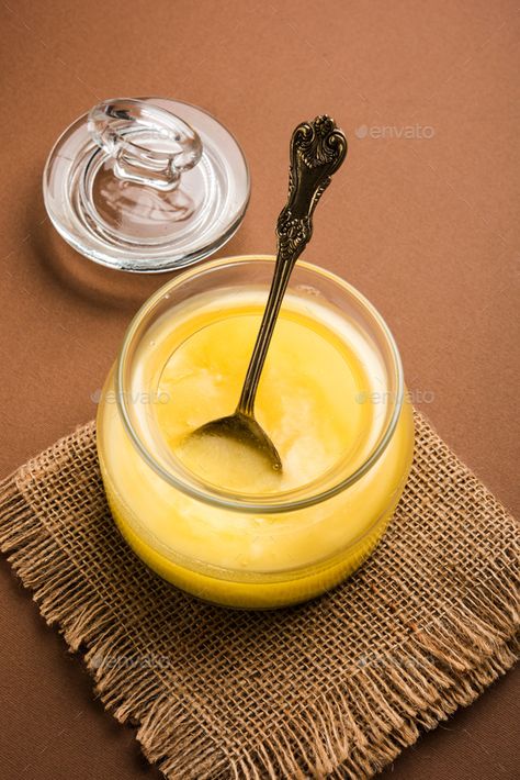 Shudh Desi Ghee by stockimagefactory. Pure Ghee Or Shudh Desi Ghee from India also known as Clarified Liquid Butter. Selective focus #Sponsored #stockimagefactory, #Pure, #Ghee, #Shudh Desi Ghee Photography, Butter Cream Frosting Recipes, Ghee Photography, Buttered Chicken, Healthy Butter, Savoury Sauces, Mathri Recipe, Butter Sauce For Pasta, Ghee Recipe