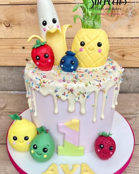 Shereen on Instagram: “Tutti Frutti themed drip cake for little Ava turning 1. The characters are based on a YouTube song with dancing fruit. #tuttifrutti…” Planning 1st Birthday Party, Youtube Cake, Dancing Fruit, Tutti Frutti Cake, Tutti Frutti Birthday Party, Hey Bear, Fruit Birthday Cake, Fruit Birthday Party, Baby First Birthday Themes