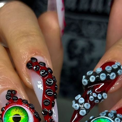 Elena ✨️ on Instagram: "Tentacle lovers 🐙 these are itttt 🔥🔥   @planet_ruby blessed me with her hands to do her festival nails and I am OBSESSED!! Was sooo much fun sculpting these ones and I'd LOVE to do more!  *Inspo from pinterest but can't find original artist*  Using✨ 🌶 @apresnailofficial 🌶 @nafprofessionals 🌶 @the_gelbottle_inc 🌶 @sissiofficial_ clay -------------------------------------- #gelx #tentaclenails #octopusnails #squidnails #3dnails #biabnails #graphicnails #nailart #badnailgal #manchesternails #festivalnails #rednails #blacknails" Tentacle Nails, Maximalism Nails, Octopus Nail Art, Octopus Nails, Spooky Nail, Bad Nails, Festival Nails, 3d Nail Art, 3d Nails