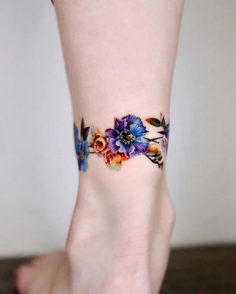 Flower Wrist Tattoos For Women, Ankle Wrap Tattoo, Wrap Around Ankle Tattoos, Ankle Band Tattoo, Tattoo Nails, Colour Tattoo For Women, Around Arm Tattoo, Bright Tattoos, Ankle Bracelet Tattoo