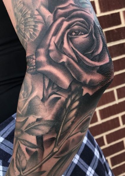 Soft Black and Grey Rose tattoo on the Elbow Rose Tattoo On Elbow Men, Elbow Rose Tattoo Men, Rose Elbow Tattoo Mens, Rose On Elbow Tattoo, Men’s Elbow Tattoo Ideas, Elbow Tattoo Men Sleeve, Rose Elbow Tattoos For Women, Rose Tattoo On Elbow, Elbow Rose Tattoo