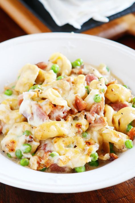 A whole meal in one pan! This Ham & Cheese Tortellini is creamy, cheesy, deliciousness in every bite! Make it in 15 minutes and everything cooks in one pan, so you only have one dish to wash. The perfect quick and easy weeknight dinner that everyone will love!! Ham And Cheese Tortellini, Frozen Tortellini, Cheese Tortellini Recipes, Tortellini Recipes, Ham Cheese, Cheese Tortellini, Quick Weeknight Meals, Ham Recipes, Easy Weeknight Dinners