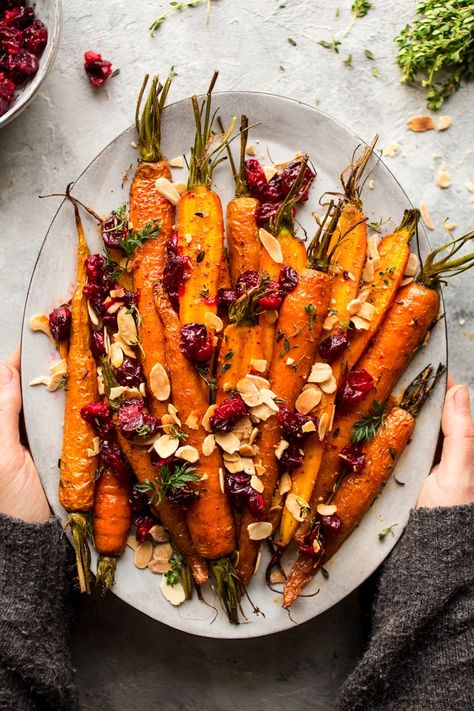 Maple roasted carrots with cranberries Carrots With Cranberries, Maple Roasted Carrots, Christmas Side Dishes, Cat Kitchen, Thanksgiving Drinks, Vegan Thanksgiving Recipes, Best Appetizer Recipes, Vegan Thanksgiving, Lazy Cat