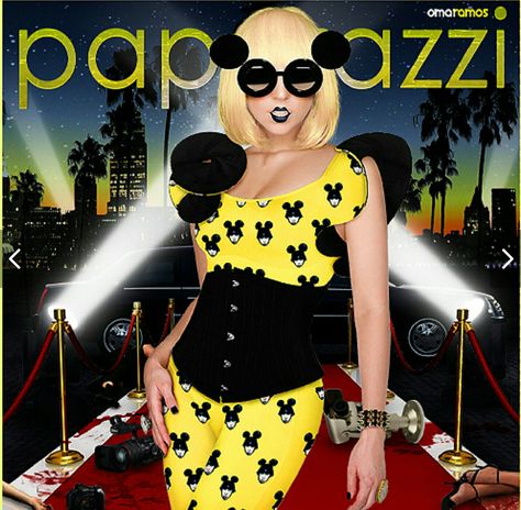 PAPARAZZI Yellow jumpsuit black shoulder pads, flip glasses, black lipstick Paparazzi Lady Gaga, Gaga Paparazzi, Lady Gaga Doll, Lady Gaga Paparazzi, Lady Gaga Outfits, Yellow Jumpsuit, Black Lipstick, Kurt Cobain, Black Jumpsuit