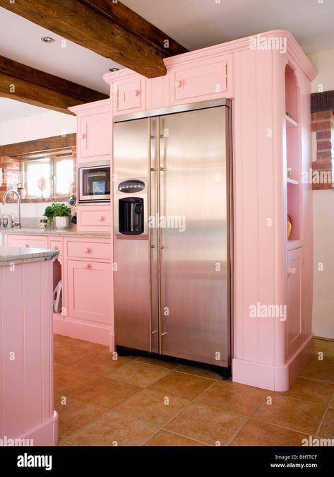 Download this stock image: Large stainless steel American-style fridge-freezer in pastel pink fitted unit in country kitchen - BHTTCF from Alamy's library of millions of high resolution stock photos, illustrations and vectors. Pink Refrigerator, Pink Fridge, Chateau Decor, Warehouse Kitchen, Double Door Fridge, Pink Kitchen Decor, American Style Fridge Freezer, Retro Fridge, Pink Kitchen