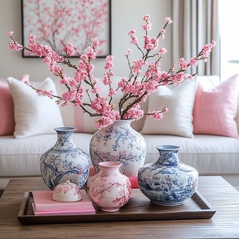 Celebrate the beauty of spring with this cherry blossom-inspired decor. Featuring soft pink accents and traditional Asian vases, this design brings freshness and elegance to any space. #CherryBlossomDecor #SpringStyle #AsianHomeDecor #SeasonalDecor Vase With Cherry Blossoms, Korean Vase, Cherry Blossom Decor, Asian Vase, Asian Inspired Decor, Asian Vases, Zen Space, Asian Home Decor, Pink Accents