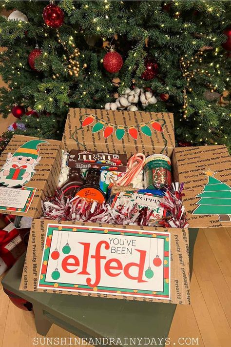 College Gift Boxes, Care Package Decorating, Holiday Care Package, You've Been Elfed, College Gift Baskets, Diy Care Package, Dorm Gifts, College Dorm Gifts, Christmas Care Package