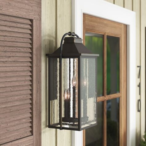 This small three-light outdoor wall fixture offered in the antique bronze painted distressed brass or brushed steel artisanal finish offers traditional design elements with nautical influences. This fixture brings about an air of luxe sophistication with a minimalist top handle, and clear seeded glass shades, with enough durability to withstand harsh weather conditions with its cast aluminum frame. Glass Panes, Outdoor Hanging Lanterns, Lantern Design, Outdoor Sconces, Outdoor Wall Lantern, Outdoor Light, Seeded Glass, Wall Lantern, Hanging Lanterns