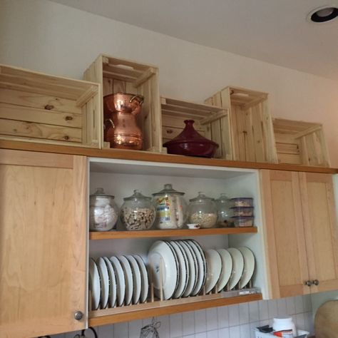 BEFORE:  Open shelving worked well for dishes.  Above the cabinets, Ikea crates were the inspiration for cubbies in the new cabinets. Above The Cabinets, Ikea Crates, Cabinets Ikea, New Cabinets, Above Cabinets, New Cabinet, Cubbies, Kitchen Renovation, Open Shelving