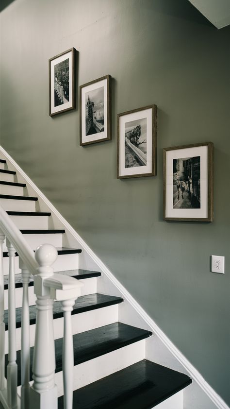 Refresh your home with the latest decor trends and elegant ideas. Explore chic inspirations and luxe designs to create a space that reflects your style. #HomeInspiration #TrendyDecor #LuxeInteriors Black Stairs Green Wall, Sage Green Staircase Wall, Dark Green Staircase Wall, Green Staircase Wall, Dark Paint Staircase, Dark Gray Accent Wall Stairs, Green Stairway, Green Staircase, Stairway Accent Wall