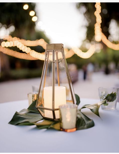 Beach Wedding Lantern Centerpieces, Tropical Foliage Centerpieces, Cocktail Table Centerpieces Tropical, Beach Cocktail Hour Wedding, Simple Tropical Centerpieces, Wedding Cocktail Table Decor, Beach Wedding Lanterns, Cocktail Centerpieces, Cocktail Hour Centerpieces