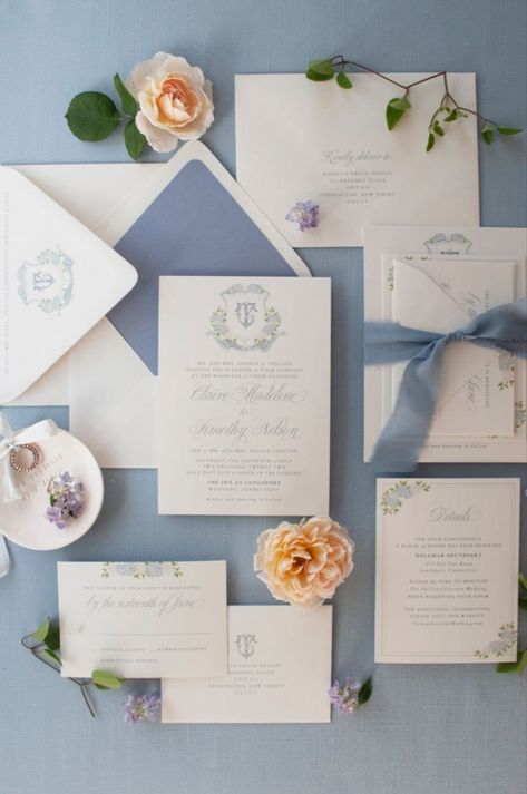 The Claire Suite features a lush blue and white hydrangea watercolor crest paired with a beautifully chic font.  Shown here with French Blue ink, and elevated with address printing, a silk ribbon and envelope liner. Blue And White Hydrangea, Coastal Wedding Invitations, Hydrangea Wedding Invitations, Crest Invitation, Crest Wedding Invitations, Watercolor Wedding Invitation Suite, Hydrangea Watercolor, Watercolor Crest, Rebecca Green