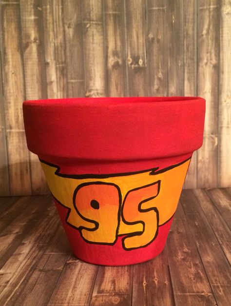 Lightning McQueen Marvel Pottery Ideas, Pottery Painting Marvel, Spider Man Plant Pot, Lighting Mcqueen Painting, Mickey Mouse Terra Cotta Pots, Disney Painted Pots, Plant Jokes, Painting Pots, Pots Ideas