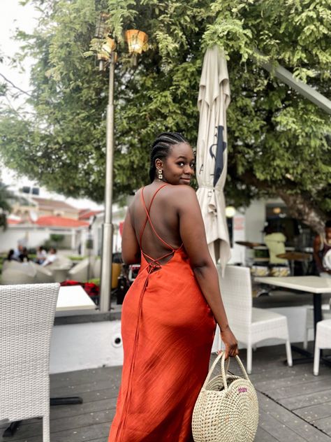 Beautiful black girl in burnt orange slip dress, vacation vibes, sisal bag, cornrows Burnt Orange Slip Dress, Orange Slip Dress, Burnt Orange Outfit, Satin Outfit, Slip Dress Outfit, Chic Evening Dress, Date Outfit Summer, Burnt Orange Dress, Brunch Dress