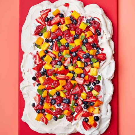 Sheet Pan Pavlova With Berries and Mangoes Sheet Pan Pavlova, Sheet Pan Pie, Sheet Pan Desserts, Fruit Pavlova, Aussie Recipes, Australian Desserts, Sweet Potato Cheesecake, Baked Meringue, Meringue Desserts