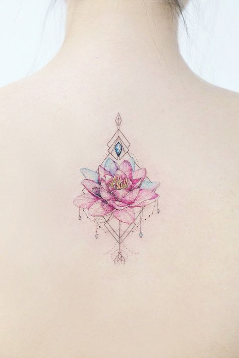 Beautiful Pink Lotus Tattoo Flower #backtattoo #geometrictattoo ★A colorful simple and minimalist or intricate and geometric lotus flower tattoo can embellish your arms, foot, shoulder, wrist, back, or thigh ★ See more: http://glaminati.com/lotus-flower-tattoo/ #lotusflowertattoo #lotusflower #lotustattoo #lotustattoodesign #glaminati #lifestyle Tattoo Buddhist, Geometric Dotwork Tattoo, Pink Lotus Tattoo, Flower Tattoo Back, Polynesian Tattoos, Shape Tattoo, Muster Tattoos, Geometric Tattoos, Japanese Sleeve