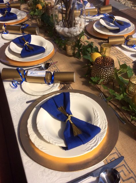 Greek blue & gold Christmas table #christmastable Table Setting Blue And Gold, Christmas Table Blue And Gold, Greek Christmas Decorations, Blue And Gold Dinner Party, Blue And Gold Place Setting, Gold Charger Blue Napkin, Greek Christmas, Greek Dinners, Greek Blue